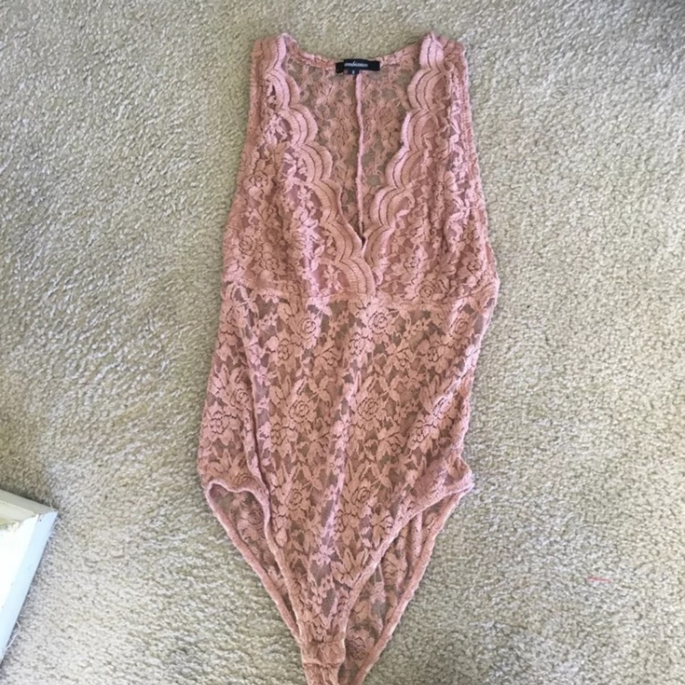 Pink lace one piece body suit